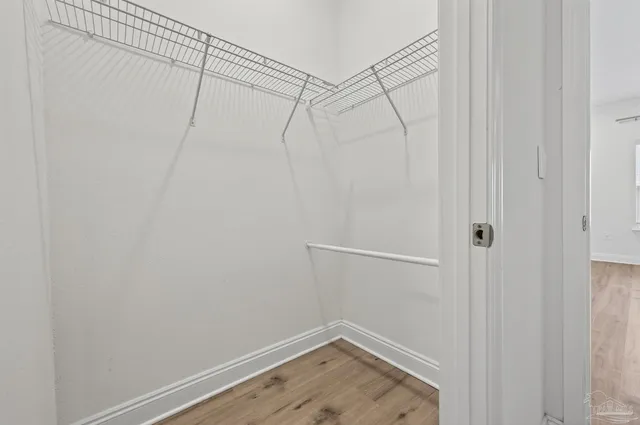 a view of a room with racks on the wall