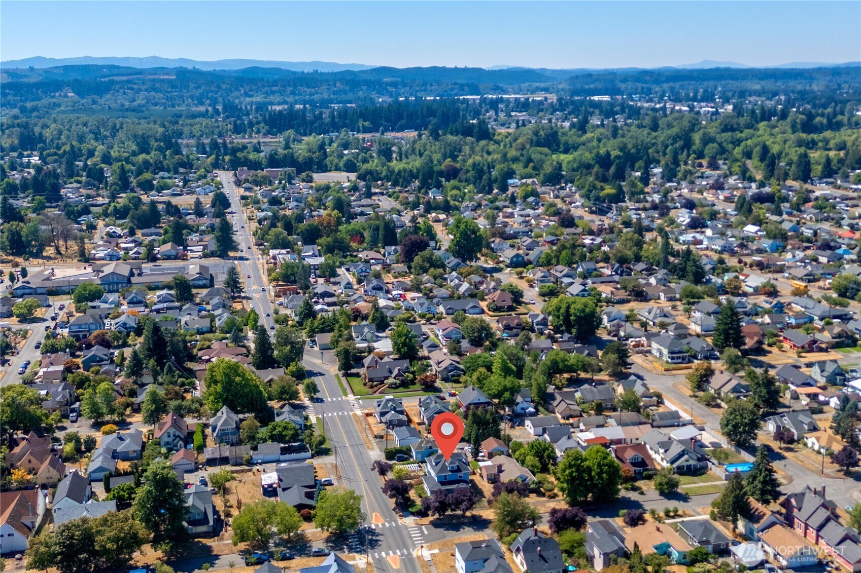 703 E Street Centralia, WA 98531 - Photo 37 of 37 an aerial view of residential houses with outdoor space and trees