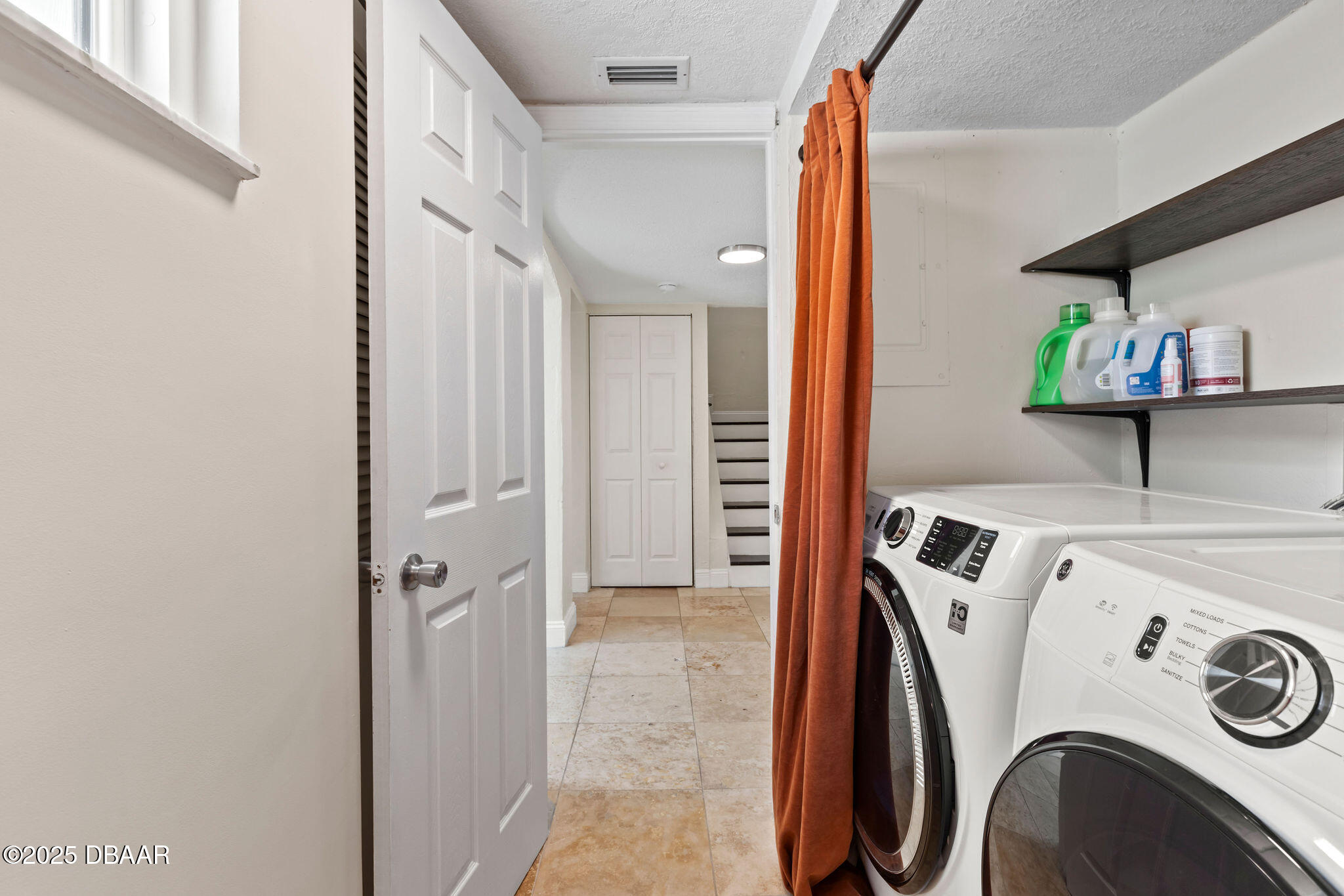 208 Pine Cone Trail Ormond Beach, FL 32174 - Photo 12 of 45 a utility room with dryer and washer