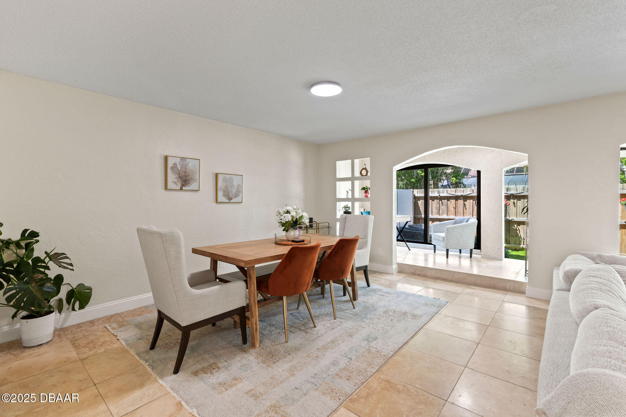 208 Pine Cone Trail Ormond Beach, FL 32174 - Photo 16 of 45 a view of a dining room with furniture window and outside view