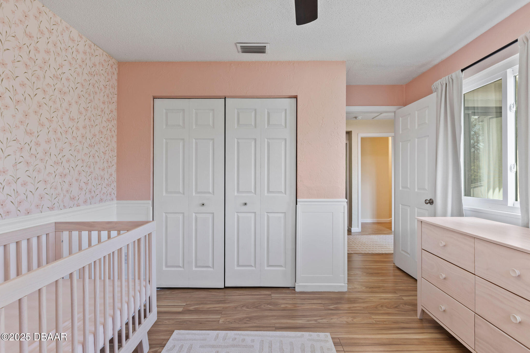 208 Pine Cone Trail Ormond Beach, FL 32174 - Photo 27 of 45 a view of a hallway view with wooden floor and staircase