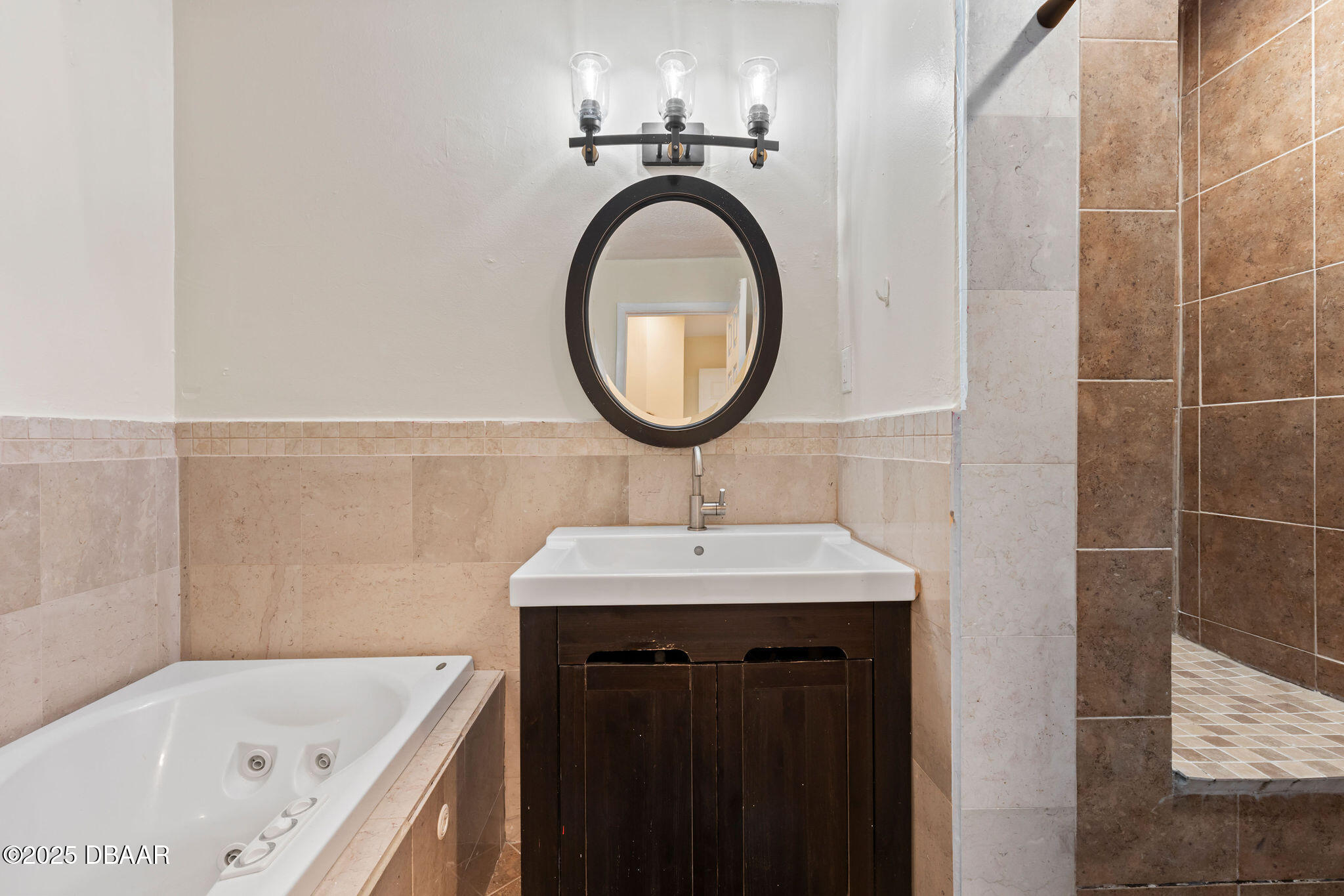 208 Pine Cone Trail Ormond Beach, FL 32174 - Photo 28 of 45 a bathroom with a sink and a bathtub
