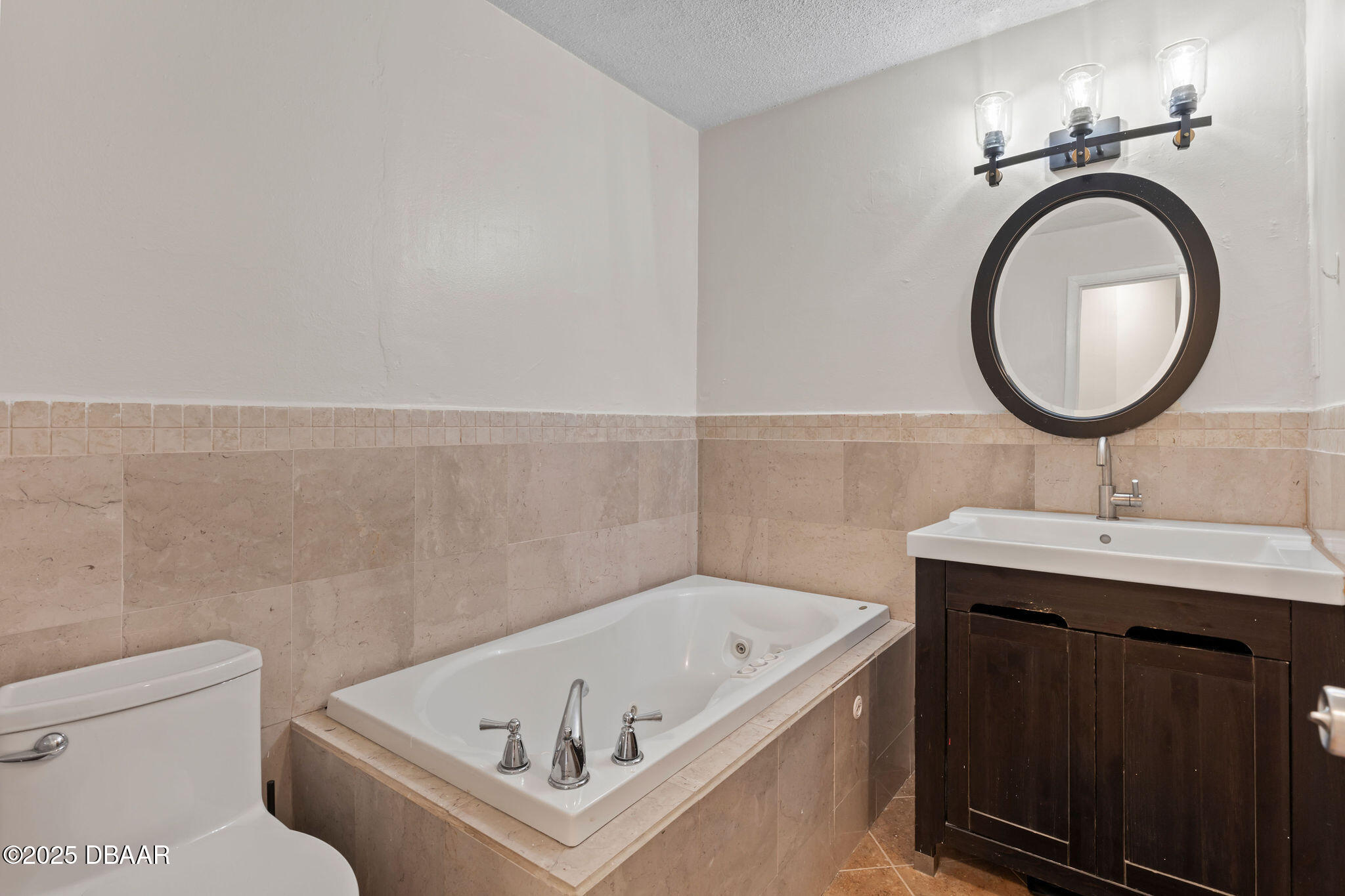 208 Pine Cone Trail Ormond Beach, FL 32174 - Photo 33 of 45 a bathroom with a sink and a toilet