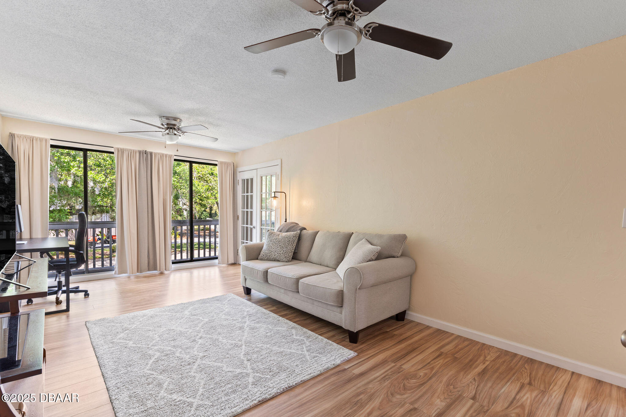 208 Pine Cone Trail Ormond Beach, FL 32174 - Photo 35 of 45 a living room with furniture and a large window