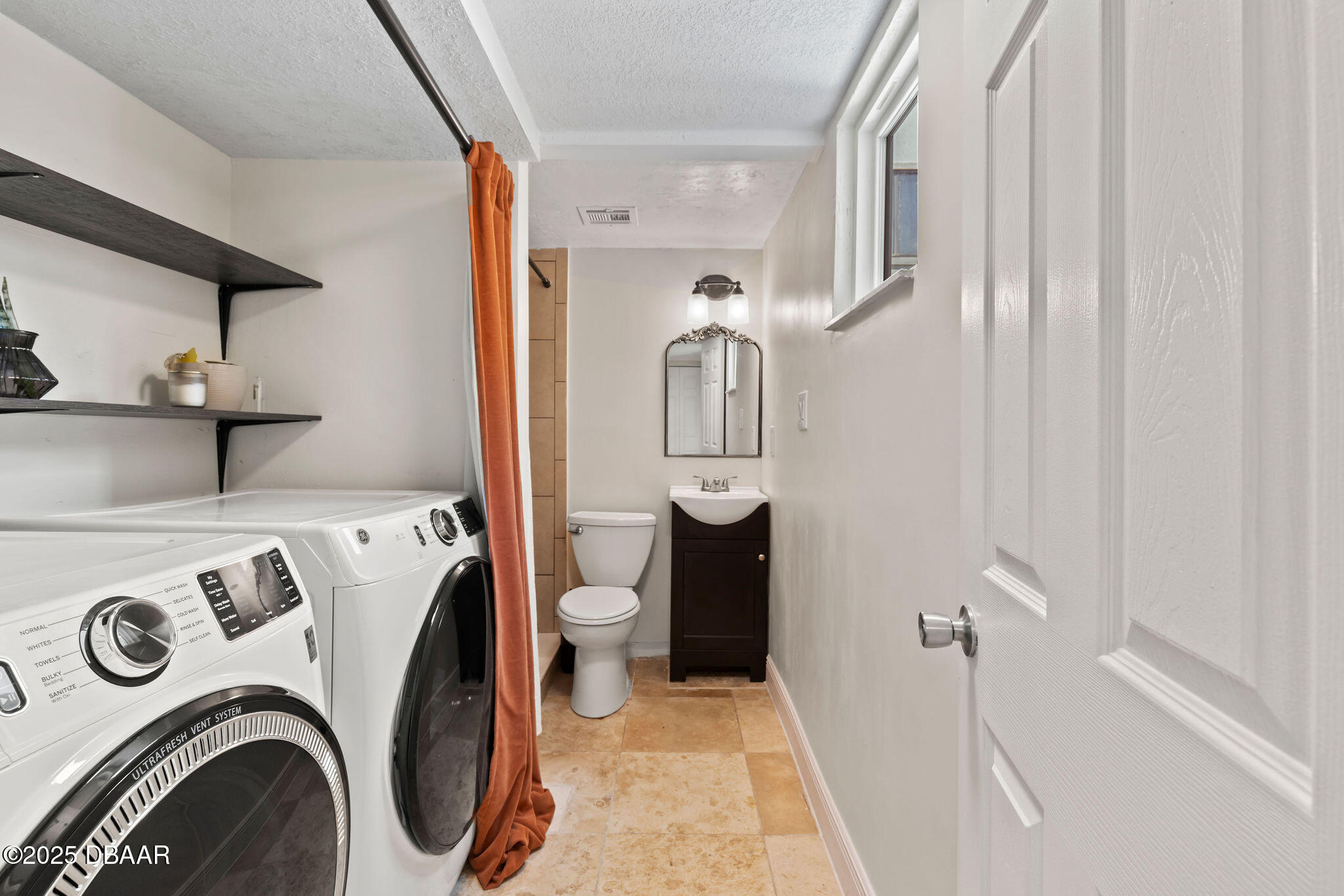 208 Pine Cone Trail Ormond Beach, FL 32174 - Photo 10 of 45 a bathroom with a sink and a toilet