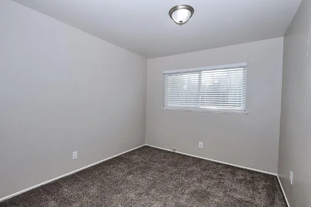 a view of an empty room with window