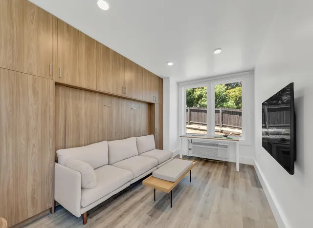 a kitchen with a stove sink and a microwave