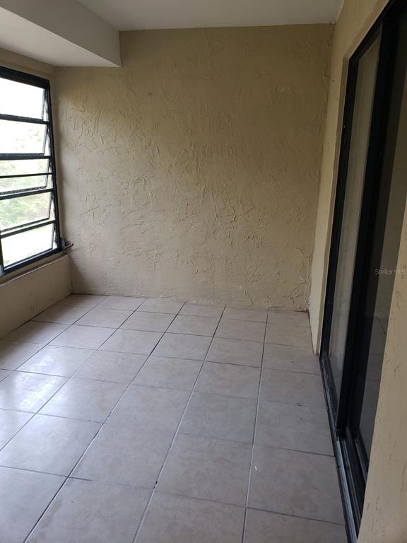 2979 Day Road, Unit C Deltona, FL 32738 - Photo 16 of 17 en empty room with windows