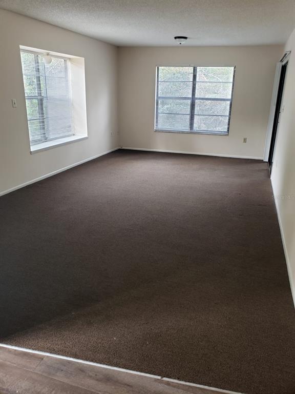 2979 Day Road, Unit C Deltona, FL 32738 - Photo 3 of 17 an empty room with windows