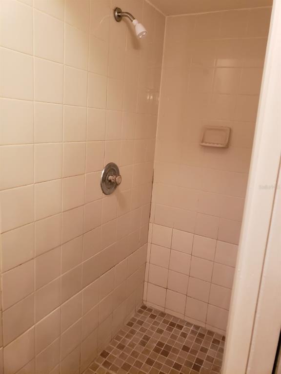 2979 Day Road, Unit C Deltona, FL 32738 - Photo 7 of 17 a bathroom with a shower