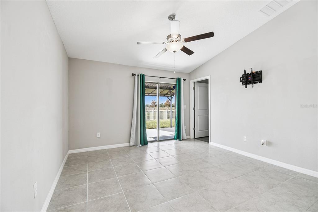 1735 Ripple Jade Place Ruskin, FL 33570 - Photo 16 of 68 a view of an empty room with a window