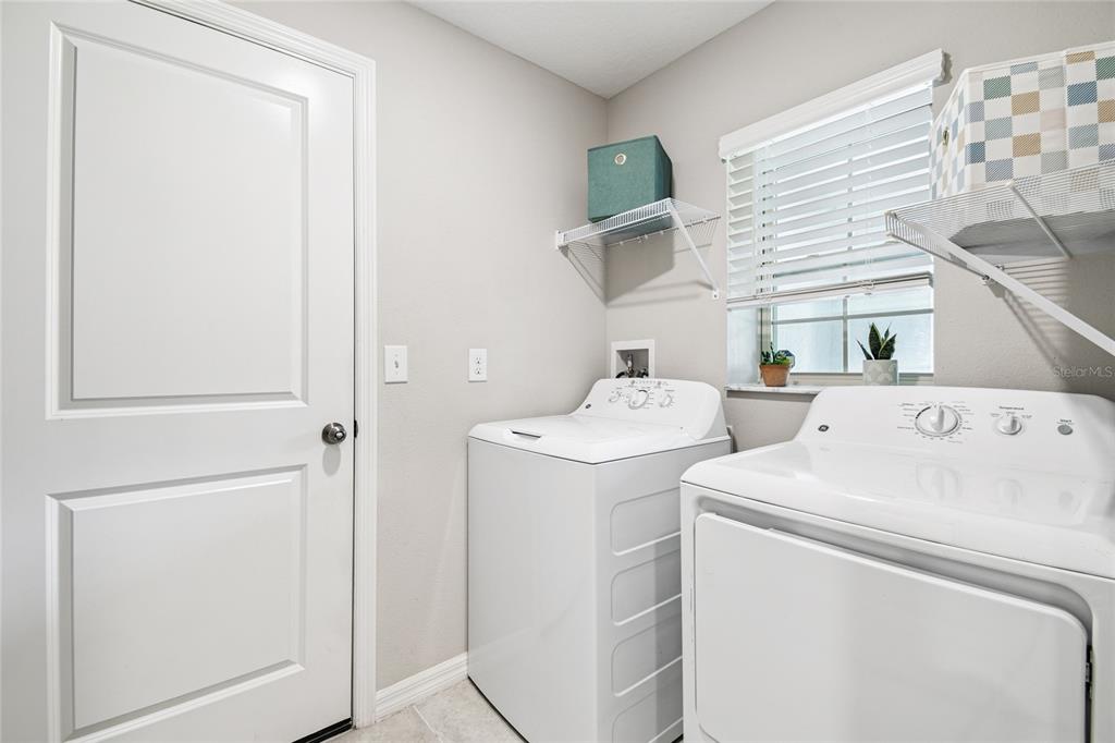1735 Ripple Jade Place Ruskin, FL 33570 - Photo 37 of 68 a utility room with dryer and washer