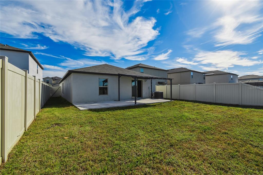 1735 Ripple Jade Place Ruskin, FL 33570 - Photo 39 of 68 a view of a house with backyard and garden