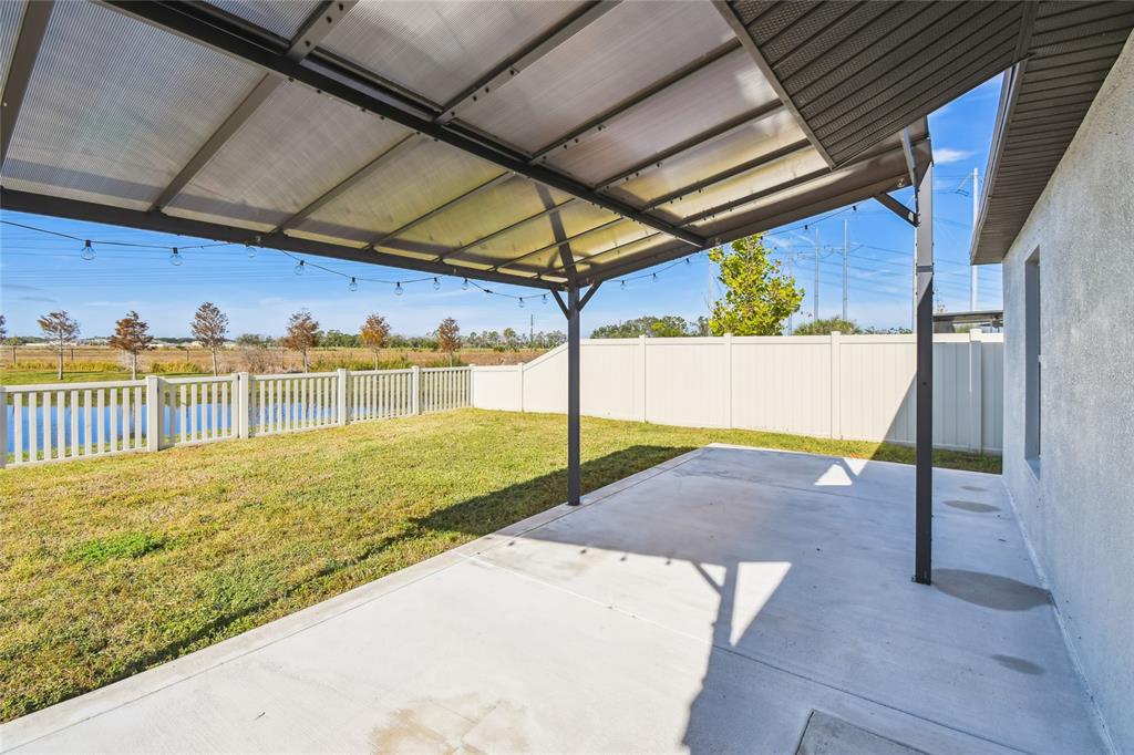 1735 Ripple Jade Place Ruskin, FL 33570 - Photo 43 of 68 a view of a backyard of the house