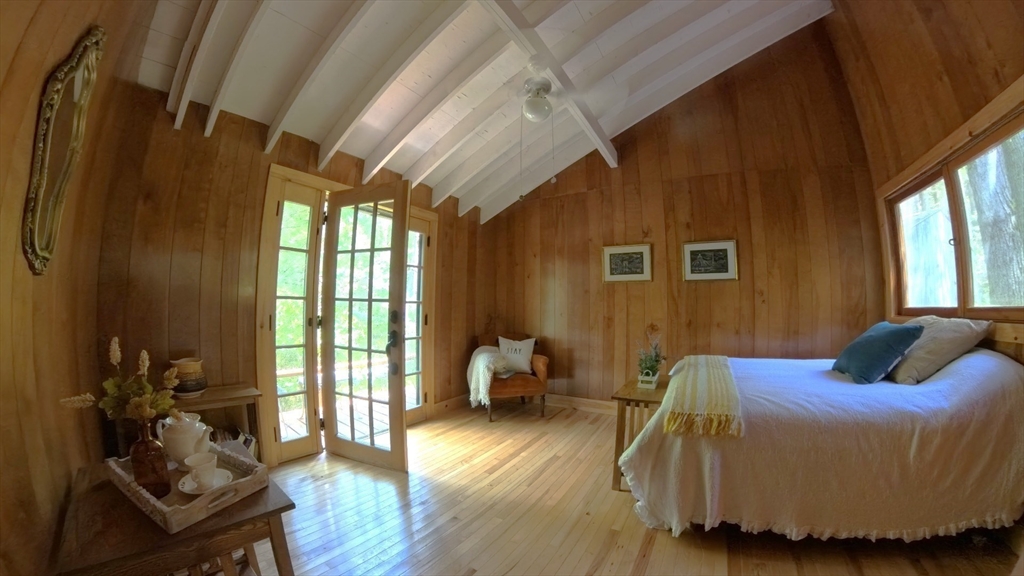 32 Pond Hill Road Goshen, MA 01096 - Photo 4 of 24 a bedroom with bed and wooden floor