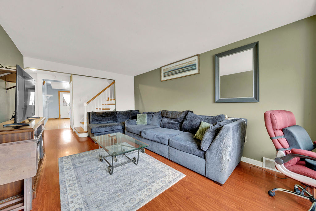 7234 South Ridgeway Avenue Chicago, IL 60629 - Photo 3 of 27 a living room with furniture rug and wooden floor