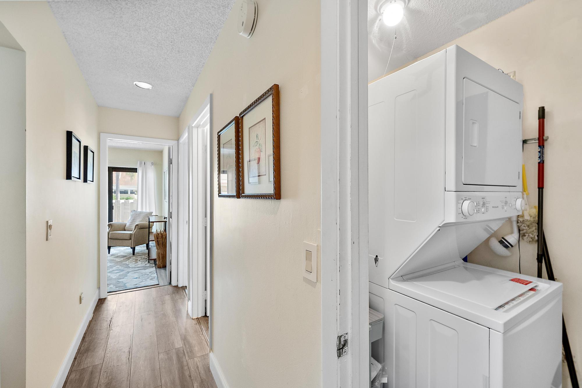 3733 Cape Pointe Circle Jupiter, FL 33477 - Photo 20 of 38 a view of hallway with wooden floor