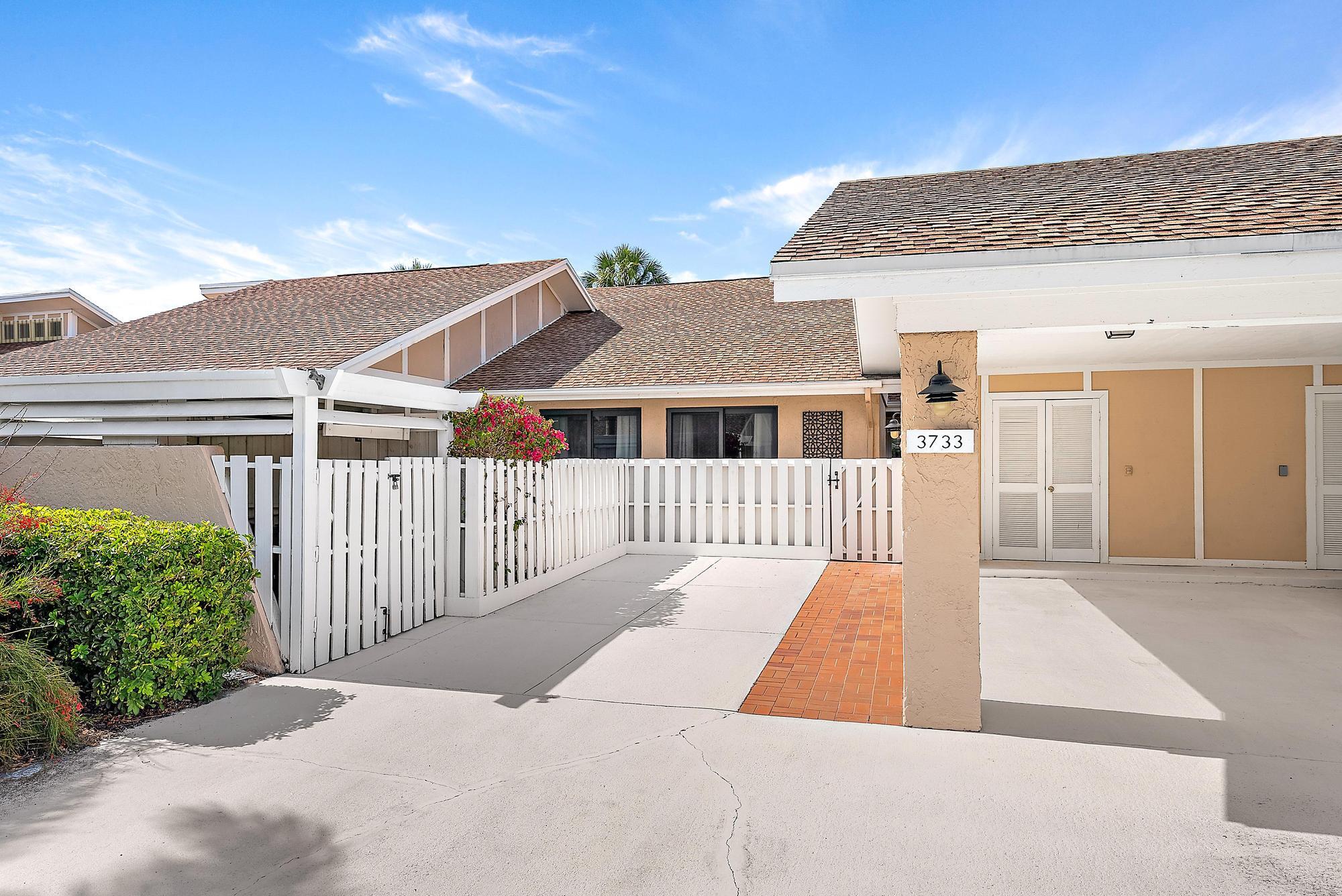3733 Cape Pointe Circle Jupiter, FL 33477 - Photo 2 of 38 a view of a house with a balcony