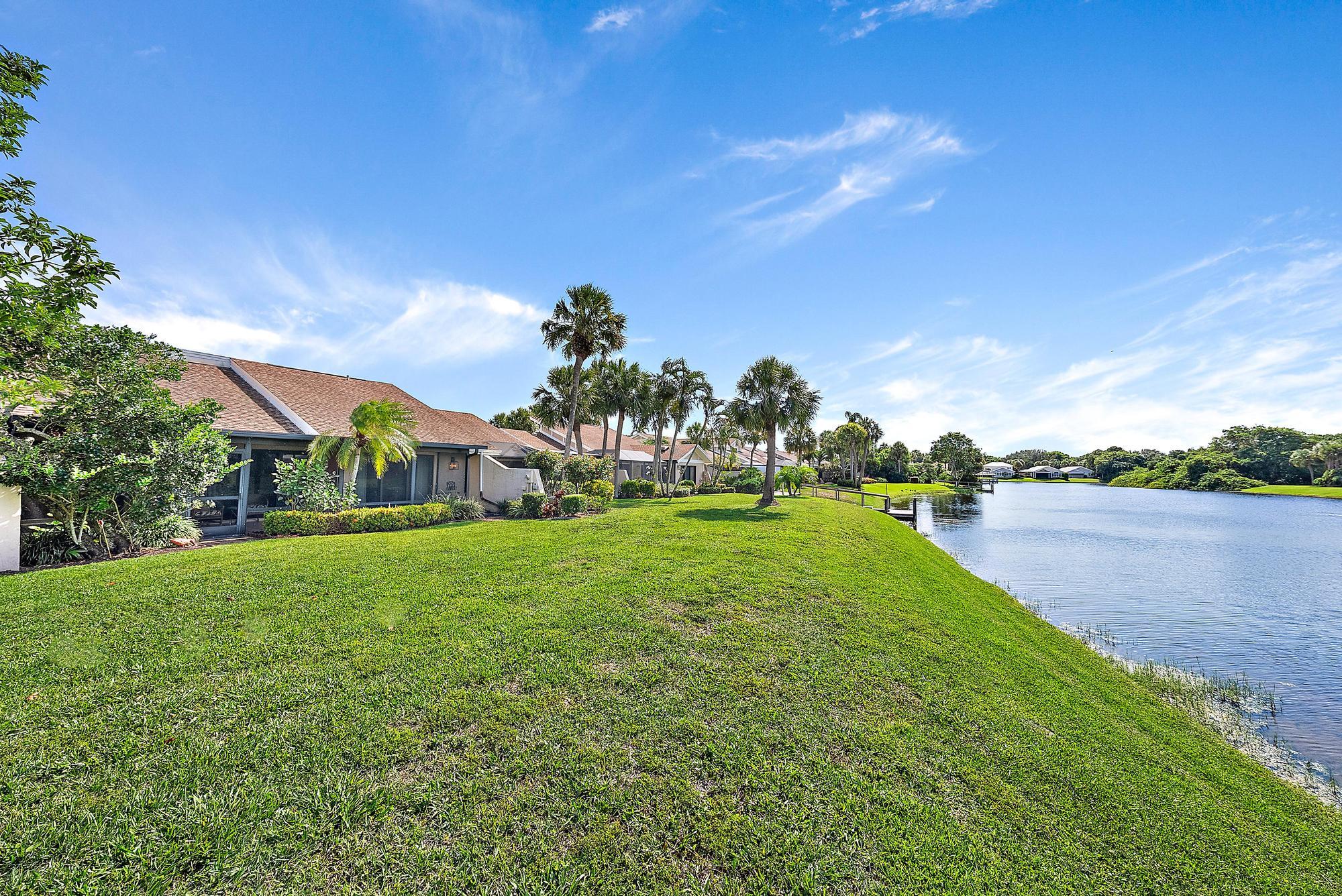 3733 Cape Pointe Circle Jupiter, FL 33477 - Photo 23 of 38 a view of a garden