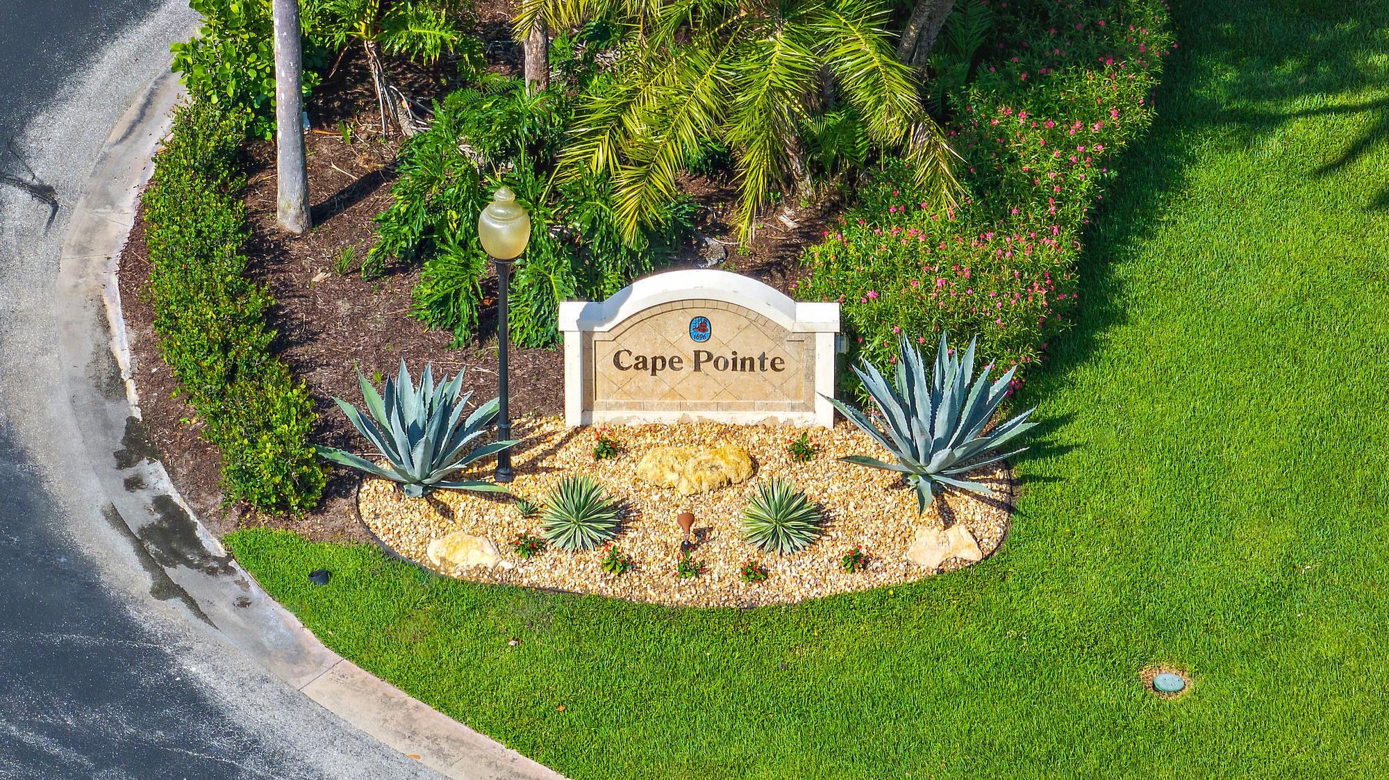 3733 Cape Pointe Circle Jupiter, FL 33477 - Photo 31 of 38 a view of a tiny house with a swimming pool