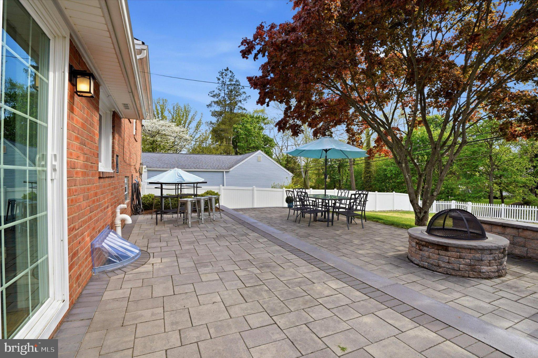 308 Lewis Road Springfield, PA 19064 - Photo 6 of 34 Charming patio with lush greenery.