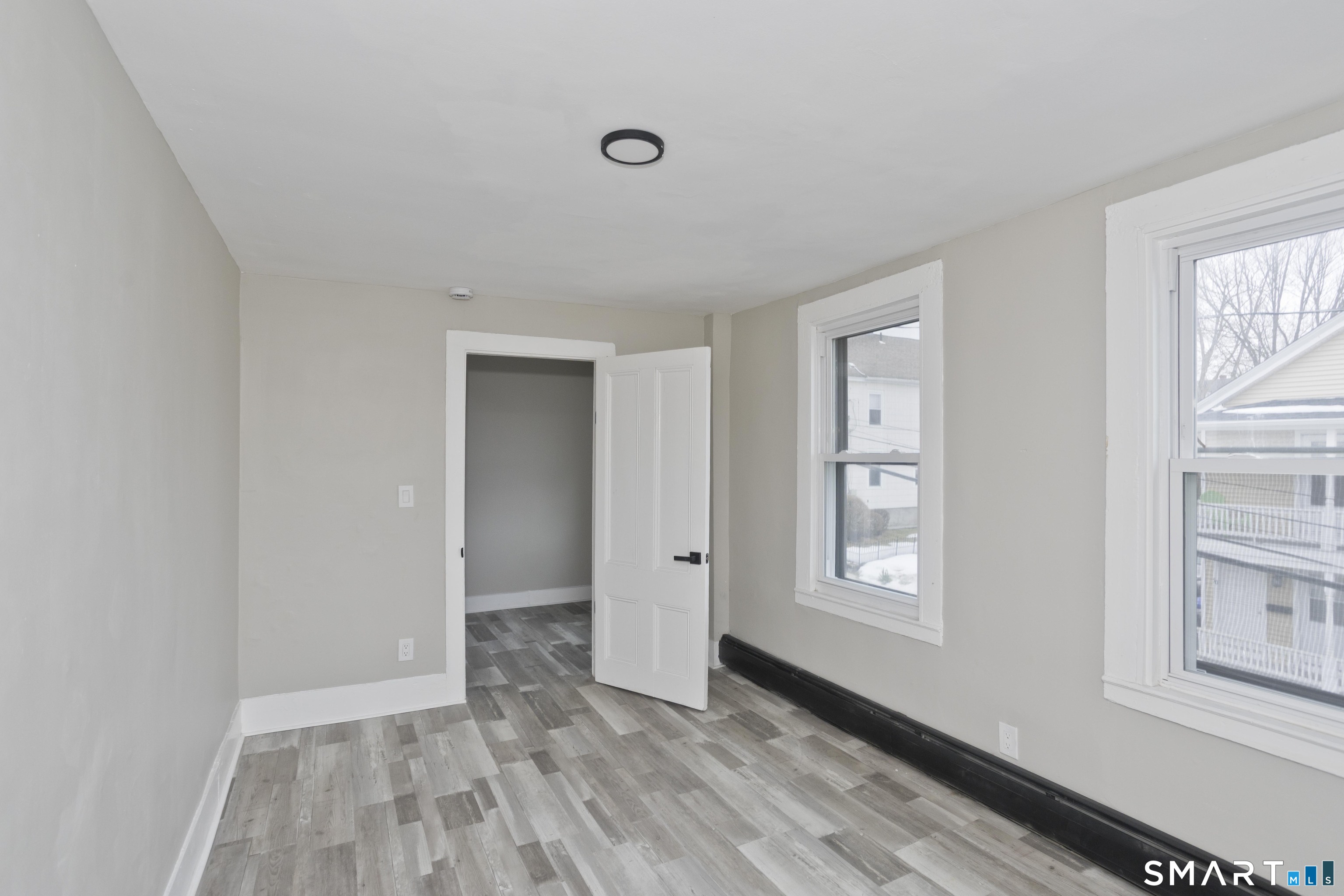 47 Maple Avenue Enfield, CT 06082 - Photo 19 of 36 an empty room with windows