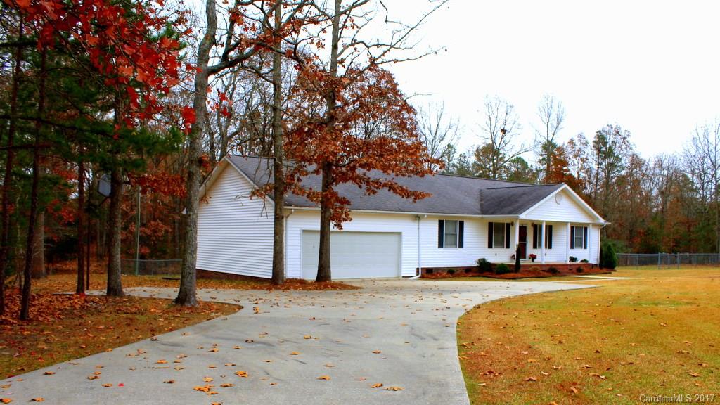 1417 Shiloh Ranch Road Lancaster, SC 29720 - Photo 1 of 23 a front view of a house with a yard