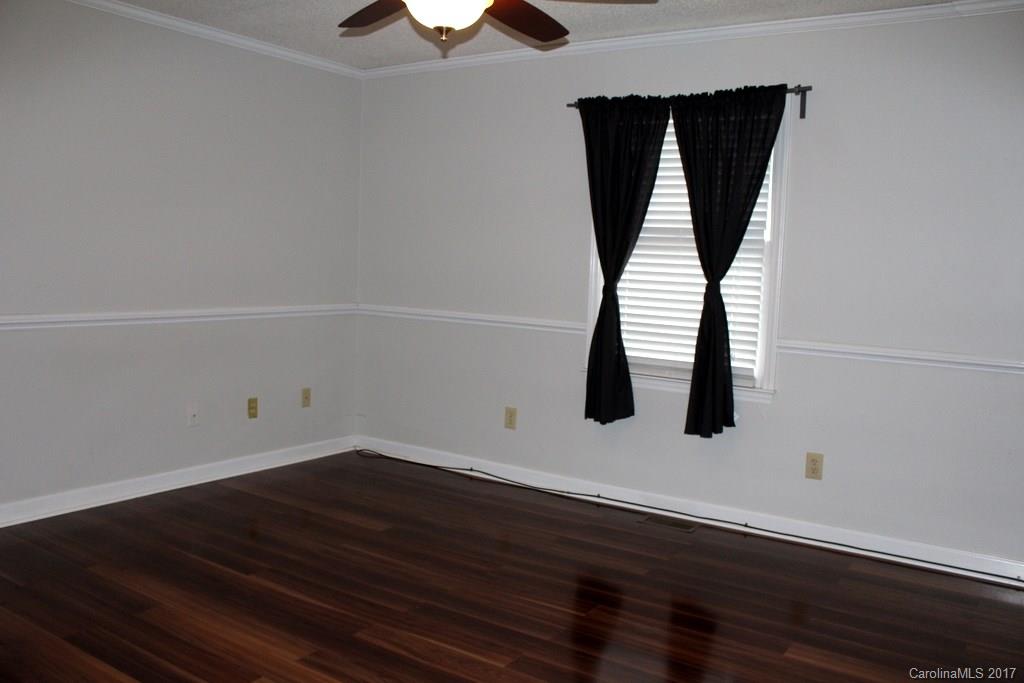 1417 Shiloh Ranch Road Lancaster, SC 29720 - Photo 12 of 23 a view of walk in closet with wooden floor