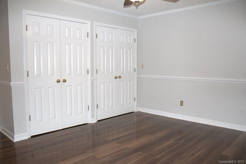 1417 Shiloh Ranch Road Lancaster, SC 29720 - Photo 13 of 23 a view of an empty room with wooden floor
