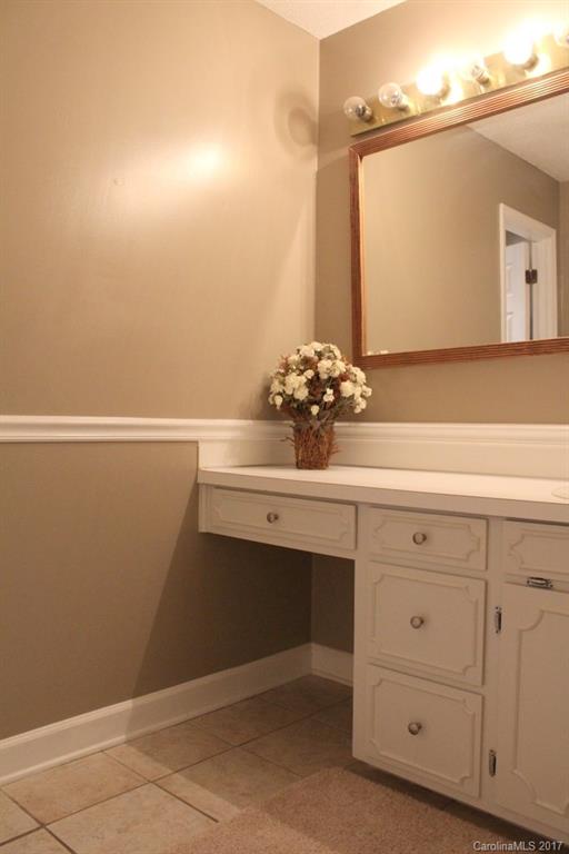 1417 Shiloh Ranch Road Lancaster, SC 29720 - Photo 14 of 23 a bathroom with a sink and a mirror