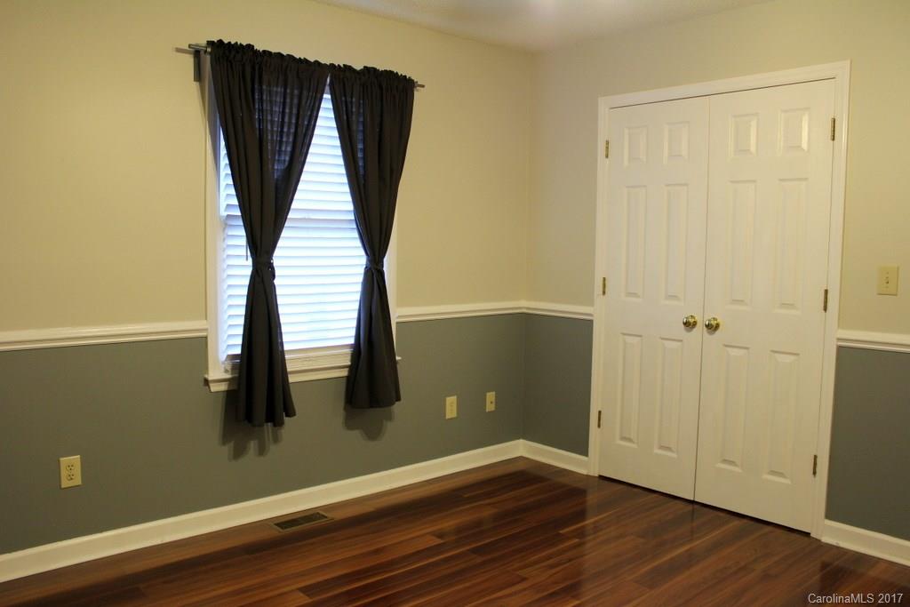 1417 Shiloh Ranch Road Lancaster, SC 29720 - Photo 15 of 23 an entryway with wooden floor and stairs