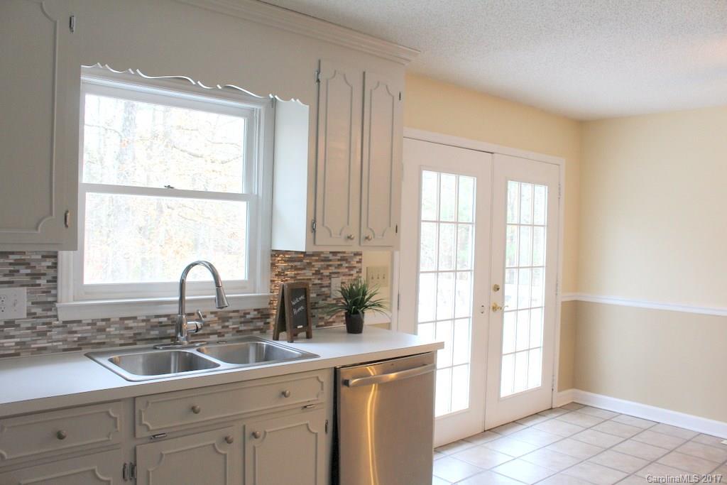 1417 Shiloh Ranch Road Lancaster, SC 29720 - Photo 10 of 23 a kitchen with a sink and large window