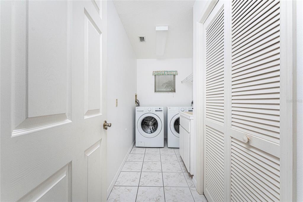 21 Bunker Lane Rotonda West, FL 33947 - Photo 20 of 51 a utility room with dryer and washer