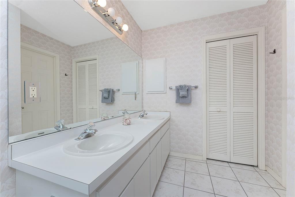 21 Bunker Lane Rotonda West, FL 33947 - Photo 37 of 51 a bathroom with a sink a toilet and shower