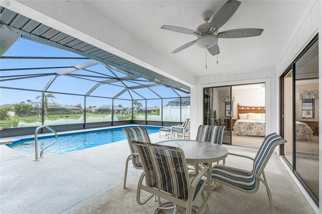 21 Bunker Lane Rotonda West, FL 33947 - Photo 40 of 51 a view of a dining room with furniture window and outside view