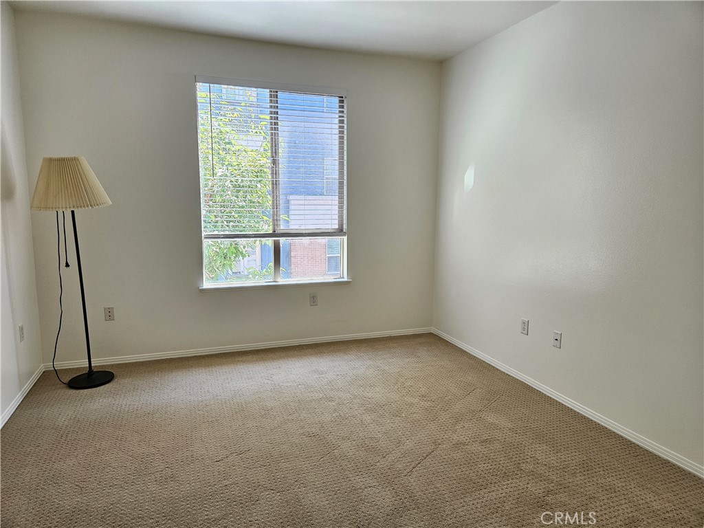 100 South Alameda Street, Unit 348 Los Angeles, CA 90012 - Photo 5 of 15 an empty room with a window
