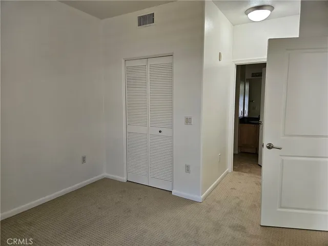 an empty room with closet