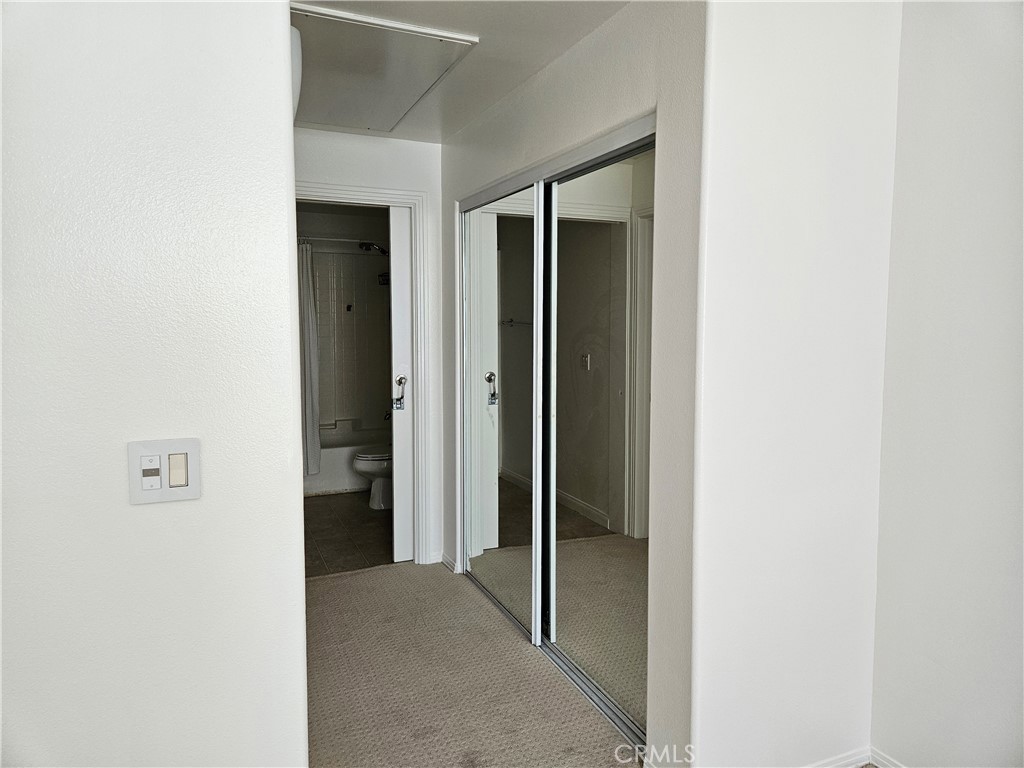 100 South Alameda Street, Unit 348 Los Angeles, CA 90012 - Photo 9 of 15 a view of a hallway with closet