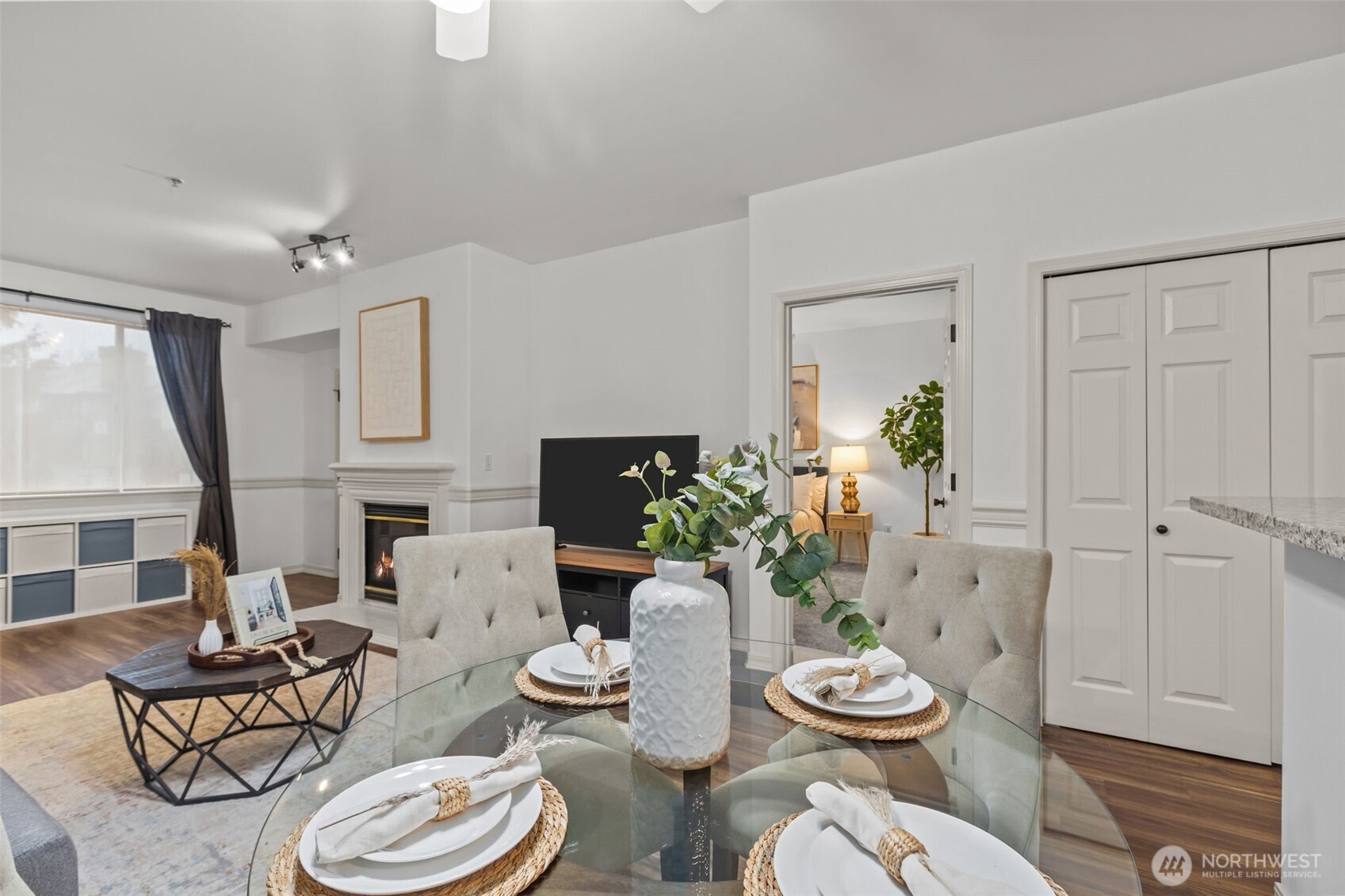440 Maple Avenue Southwest, Unit A106 Renton, WA 98057 - Photo 12 of 39 a bathroom with a toilet a sink and a mirror