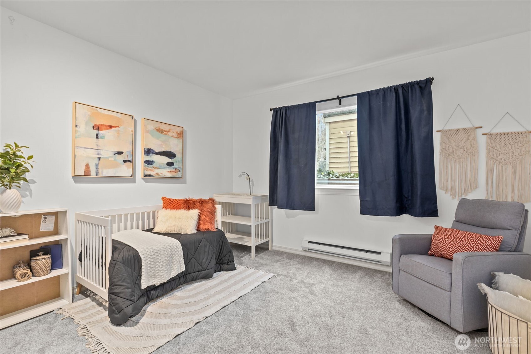 440 Maple Avenue Southwest, Unit A106 Renton, WA 98057 - Photo 24 of 39 a bedroom with a bed couch and a window