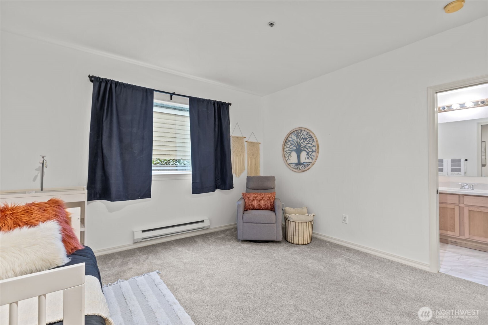 440 Maple Avenue Southwest, Unit A106 Renton, WA 98057 - Photo 25 of 39 a living room with furniture and a window