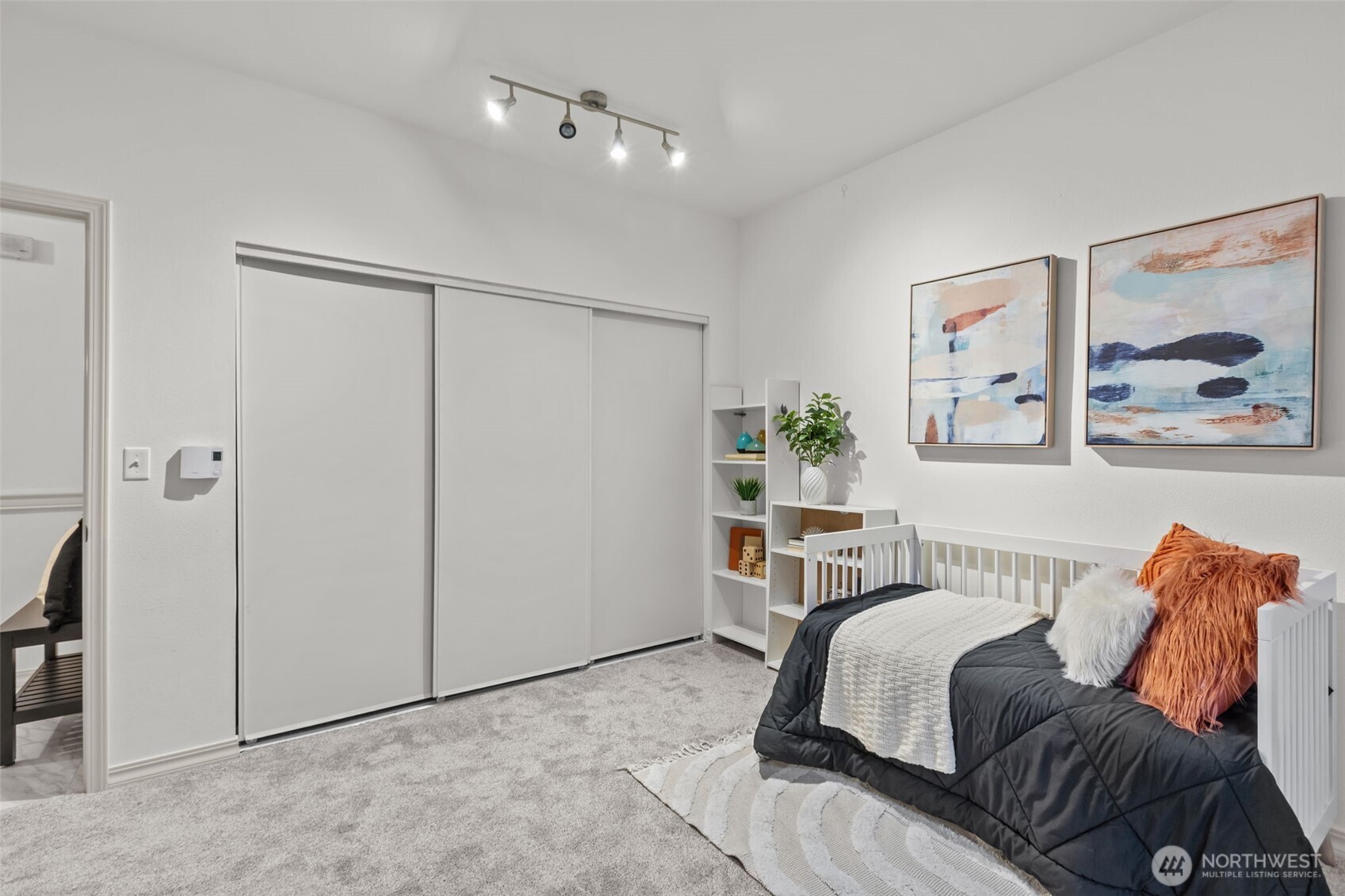 440 Maple Avenue Southwest, Unit A106 Renton, WA 98057 - Photo 27 of 39 a living room with furniture and a painting on the wall