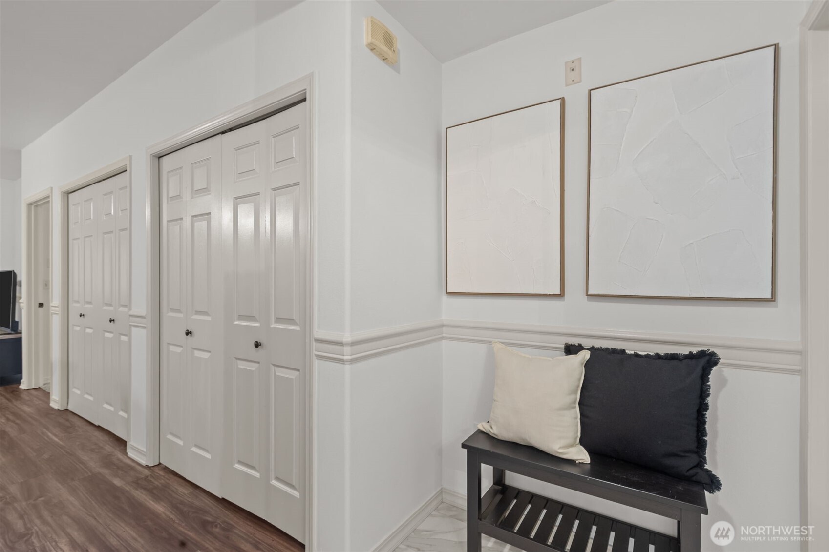 440 Maple Avenue Southwest, Unit A106 Renton, WA 98057 - Photo 29 of 39 a view of an empty room with wooden floor and cabinet