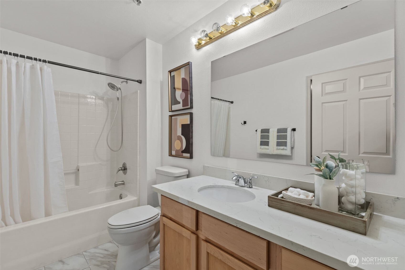 440 Maple Avenue Southwest, Unit A106 Renton, WA 98057 - Photo 31 of 39 a bathroom with a granite countertop sink a toilet and shower