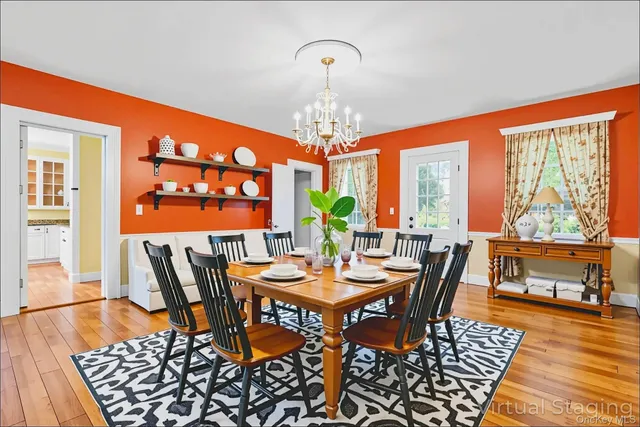 a bathroom with a sink a toilet and a window
