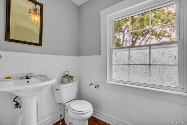 a view of kitchen with furniture and wooden floor