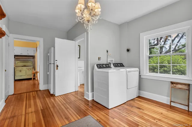 a view of a room with racks and a window