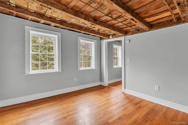 a bedroom with a bed and a table in it