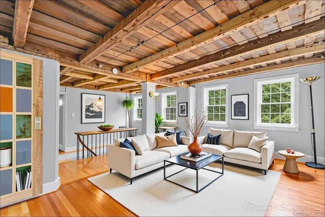a view of entryway with wooden floor