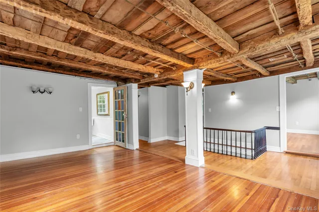 a spacious bathroom with a bathtub and sink